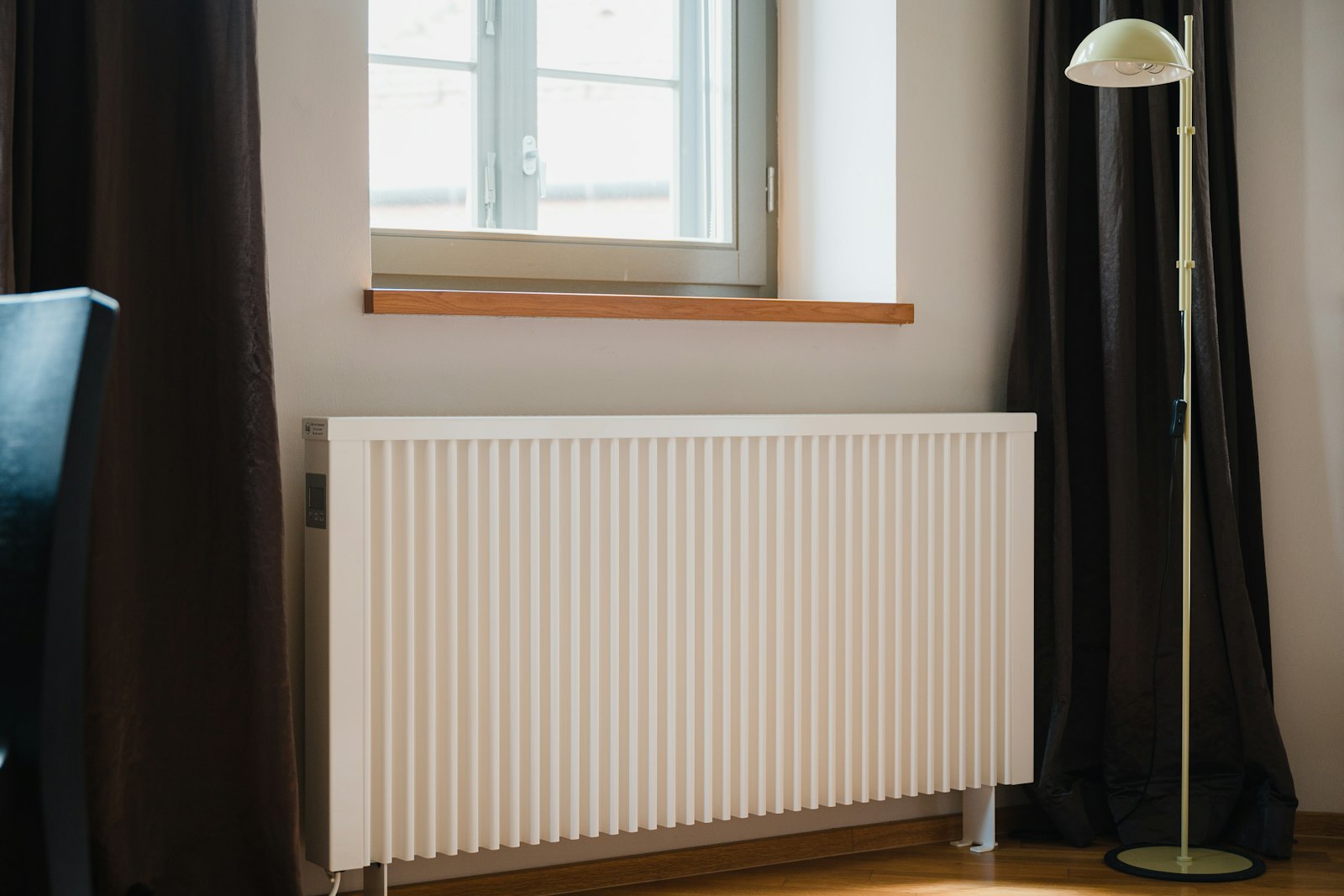 White radiator in a bright room